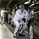 Illustration for article titled Honda Unveils Experimental Robot Legs, Human Cyborgization Not Far Behind